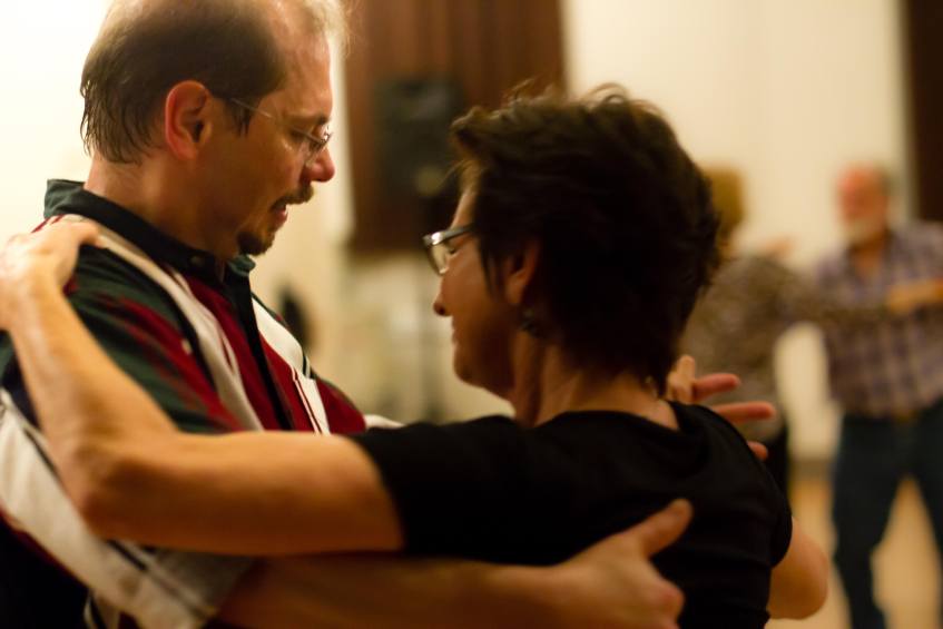 A couple stands in waltz position on the dance floor. Photo by Sam Whited, used here under Creative Commons license with thanks.